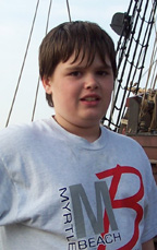 Crewmember Daymien, at the beginning and end of his voyage.