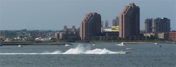 Motorboats hold a race through New York Harbor.