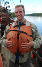 Mr. Beider rubs the belly in his life jacket.