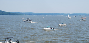 A long pan of the River Day flotilla in Haverstraw Bay.