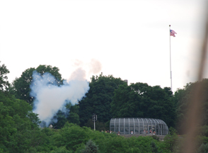 Pillars of smoke rise as West Point fires its salute.