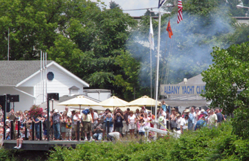 The Albany Yacht Club fires salutes to the River Day Flotilla.